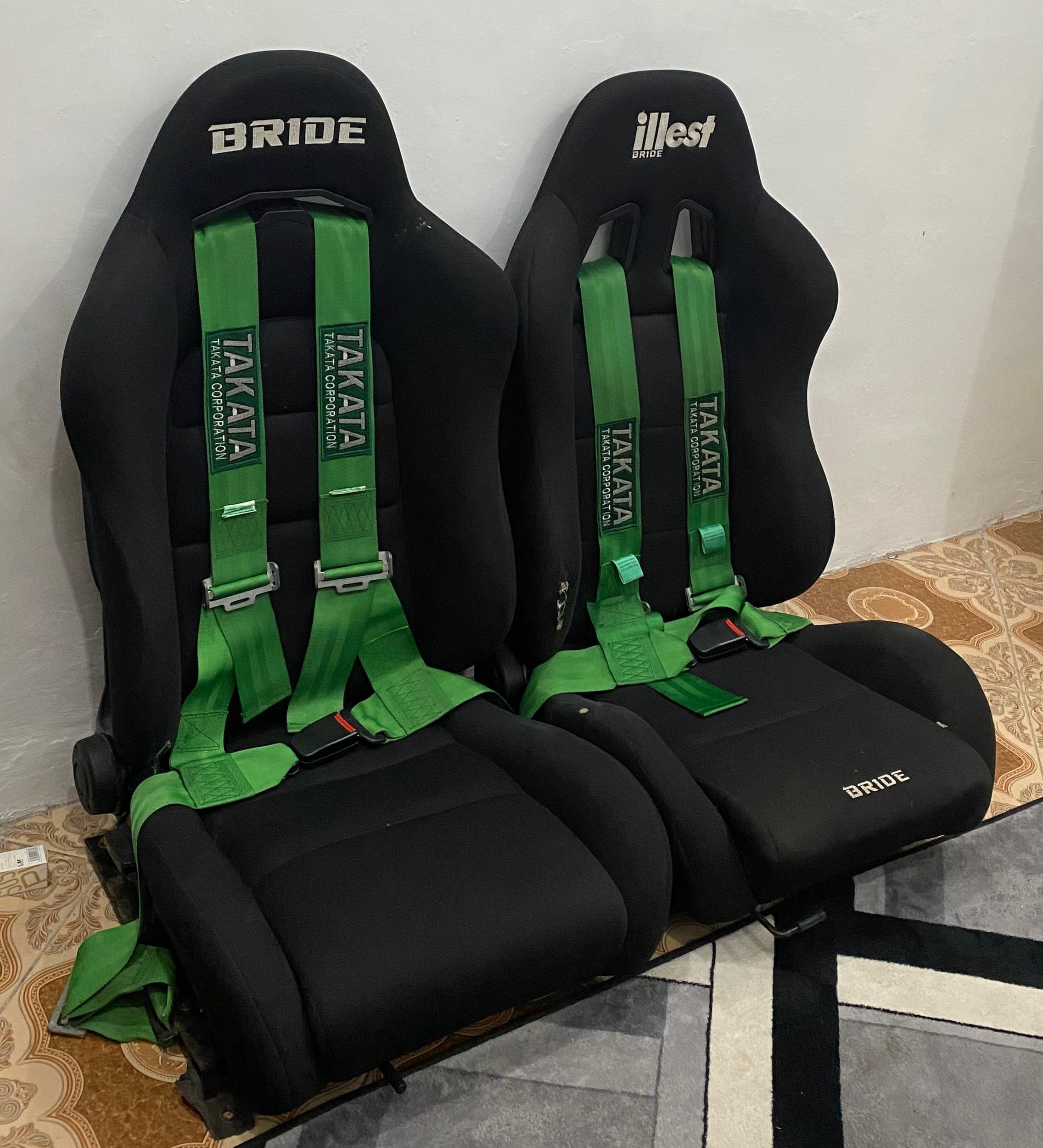 Bride racing seats with green harnesses